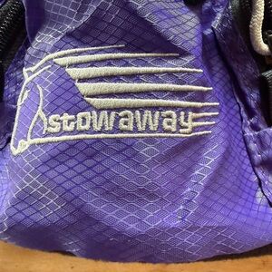 Purple Stowaway pack for a western saddle